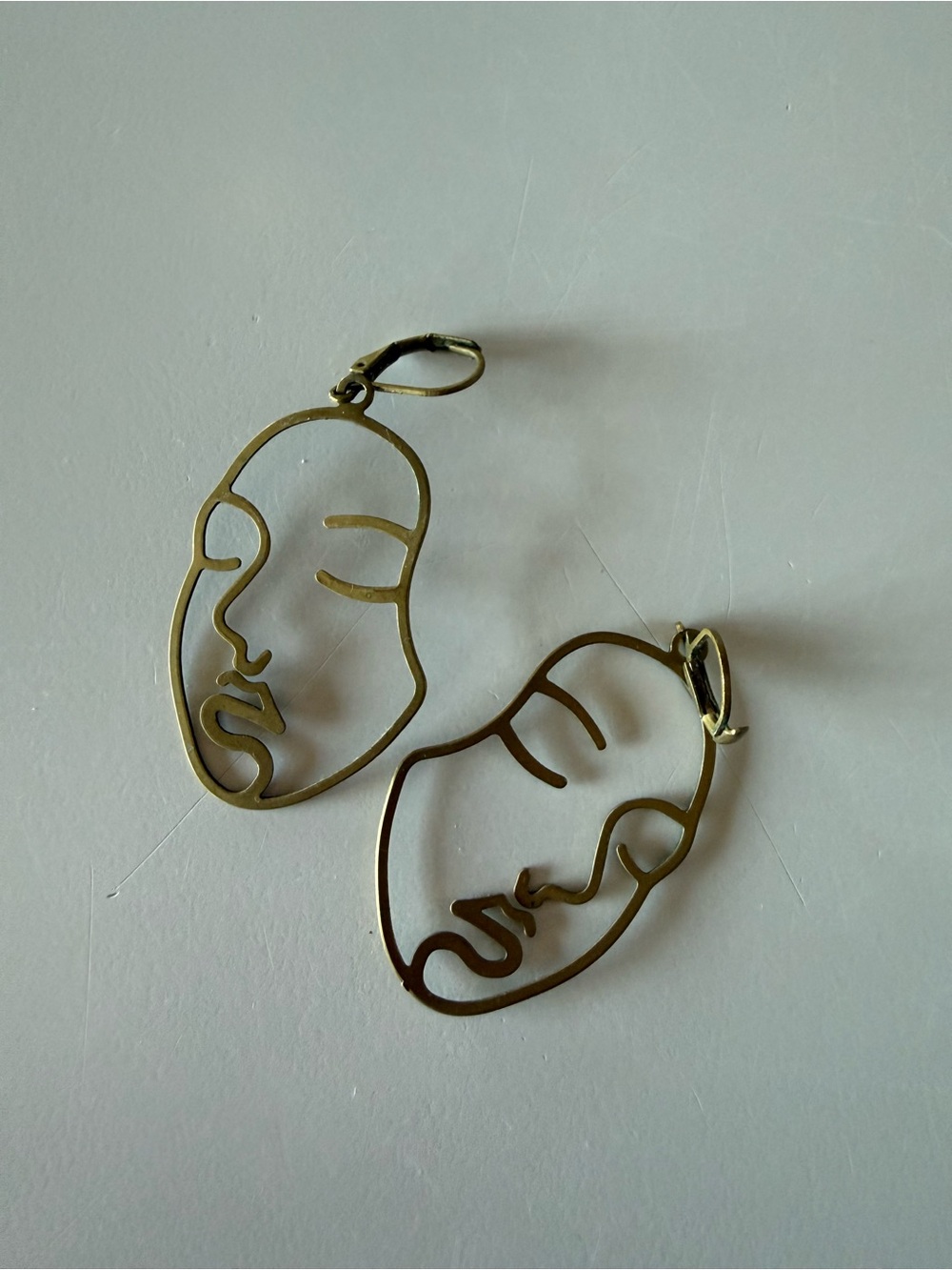 Minimalist Abstract Face Hoop Earrings in brass